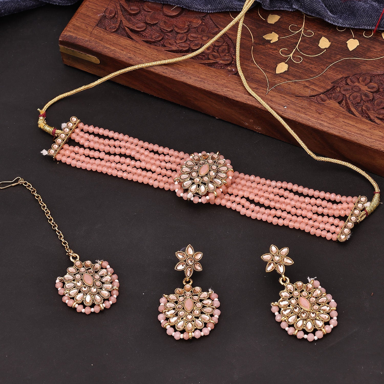 Sukkhi Spectacular Reverse AD & Pearl Choker Gold Plated Peach Necklace Set For Women