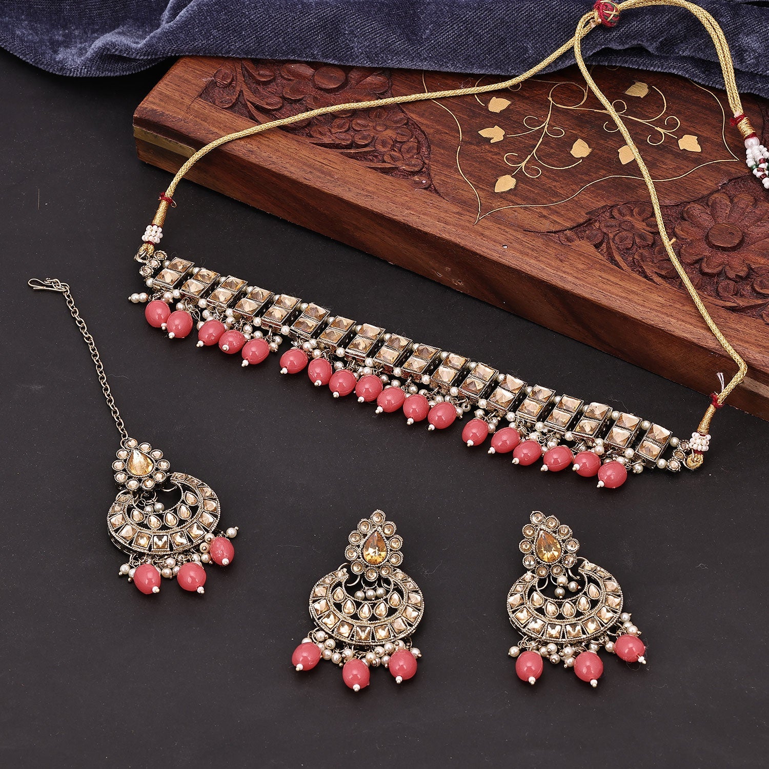 Sukkhi Stylish Reverse AD & Pearl Choker Gold Plated Pink Necklace Set For Women
