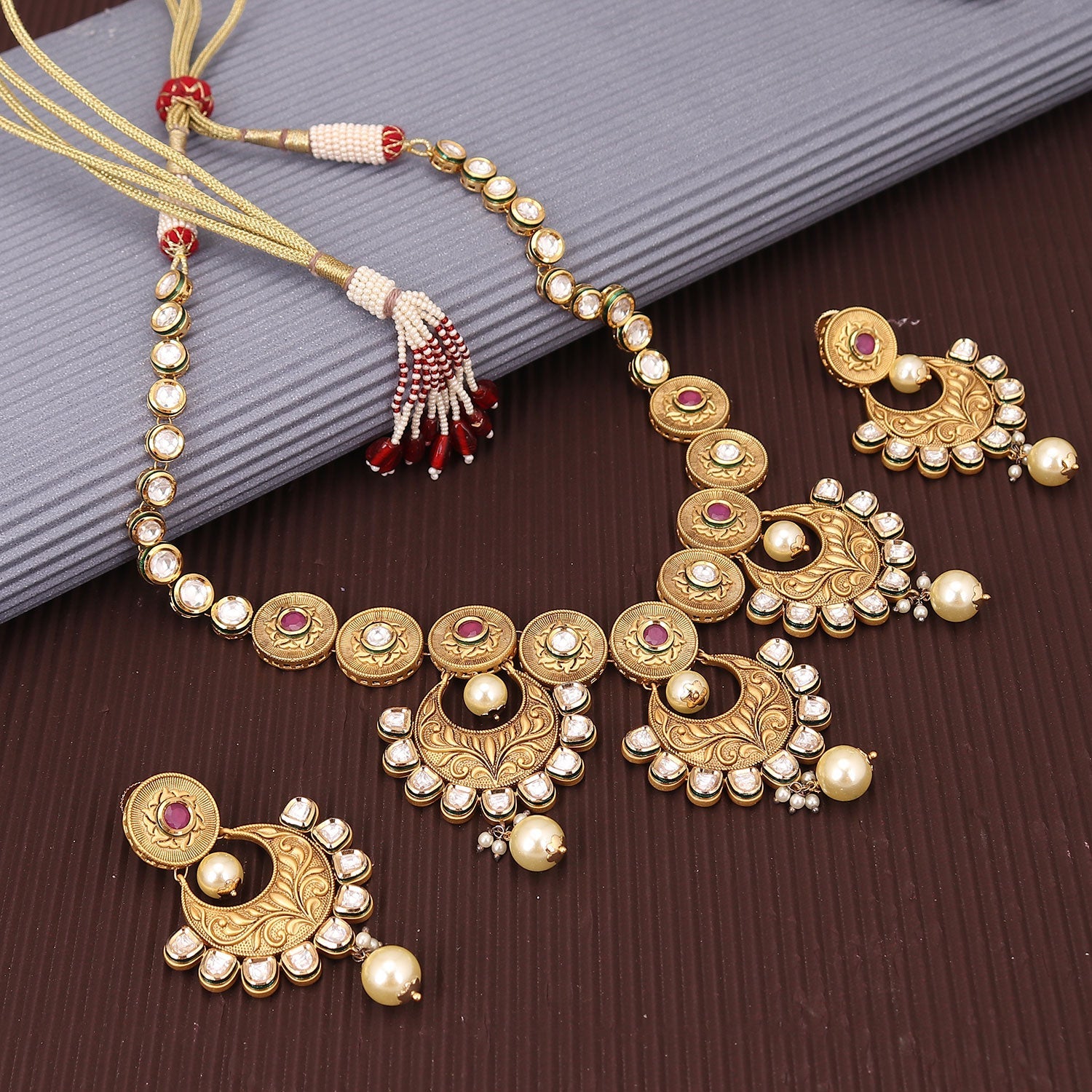 Sukkhi Chandbali Design Gold Plated Kundan Pearl Choker Necklace