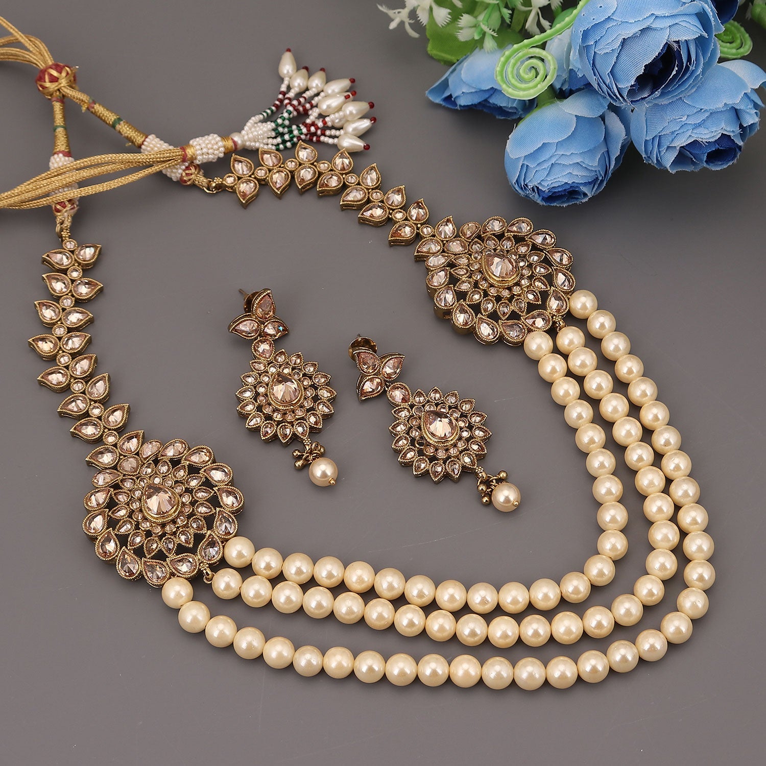 Sukkhi String Trendy Gold Plated Kundan Pearl Necklace Set For